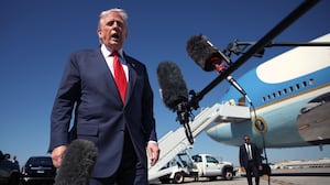 WEST PALM BEACH, FLORIDA - OCTOBER 31: US President Donald Trump speaks to reporters as he arrives at Palm Beach International Airport on October 31, 2025 in West Palm Beach, Florida. Trump is spending the weekend at his Mar-A-Lago estate in Palm Beach, Florida. (Photo by Samuel Corum/Getty Images)