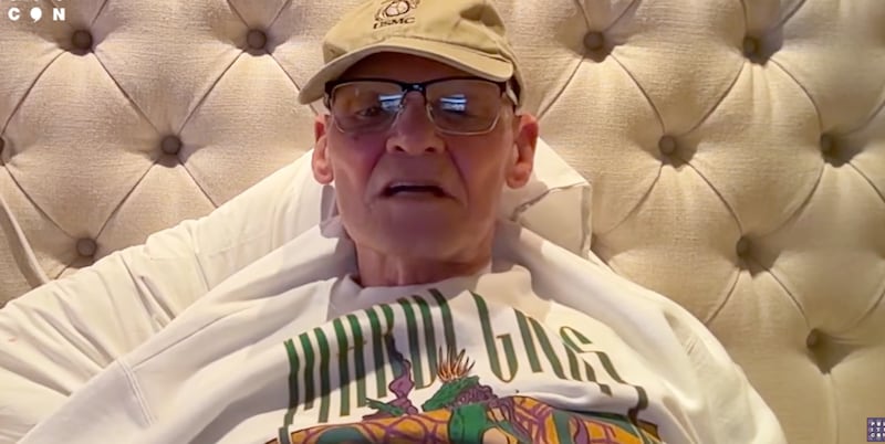 James Carville records his podcast from bed.