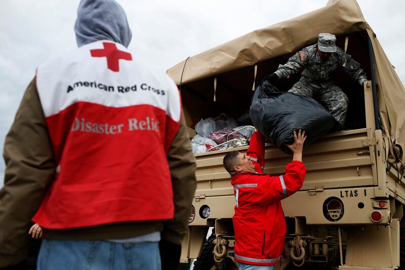 galleries/2012/11/06/price-gougers-looters-more-villains-of-hurricane-sandy-photos/sandy-villains-red-cross_vbd7fh