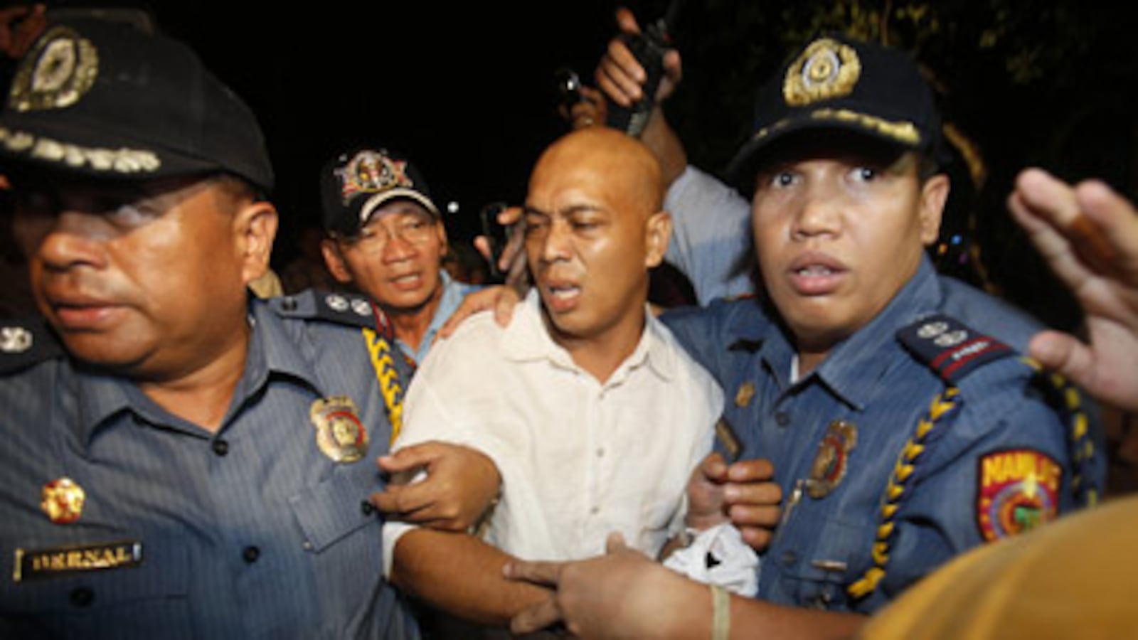 cheats/2010/08/23/bloody-end-to-philippines-bus-hijacking/philippines-bus-hijacking_yrfkcp