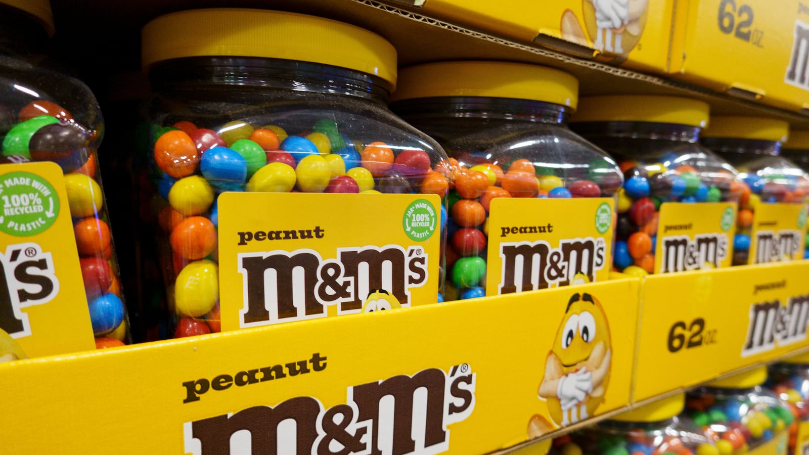 SAN DIEGO, CALIFORNIA - JULY 12: Packages of peanut M&M's milk chocolate candy are stacked at a Costco Wholesale store on July 12, 2025 in San Diego, California