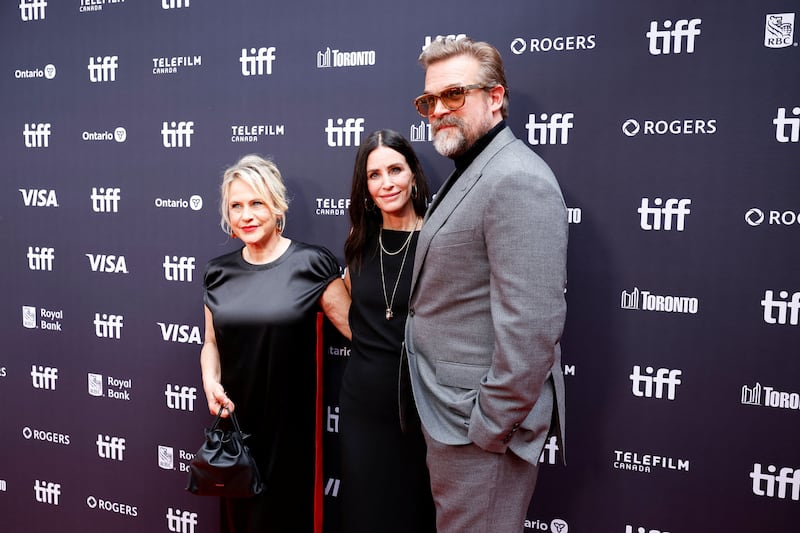 Patricia Arquette, Courteney Cox and David Harbour attend the red carpet for "Evil Genius" at the Toronto International Film Festival (TIFF) in Toronto, Ontario, Canada, September 12, 2026. REUTERS/Carlos Osorio