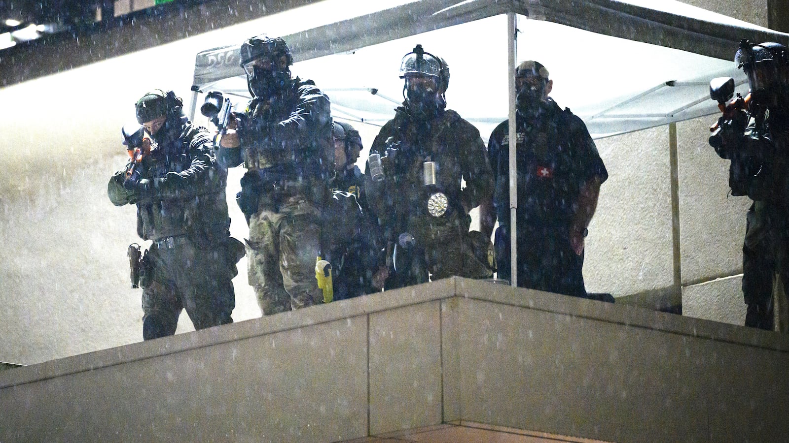 Federal agents target protesters with "less lethal" weapons at the U.S. Immigration and Customs Enforcement building