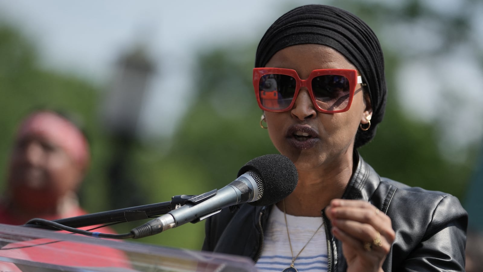 US Representative Ilhan Omar (D-MN) speaks to protesters near the White House during a Free Kilmar Abrego Garcia Now rally in Washington, DC on May 1, 2025. Abrego Garcia was detained in Maryland in February 2025 and expelled to El Salvador along with 238 Venezuelans and 22 fellow Salvadorans who were deported shortly after President Donald Trump invoked a rarely-used wartime authority. (Photo by Oliver Contreras / AFP) (Photo by OLIVER CONTRERAS/AFP via Getty Images)