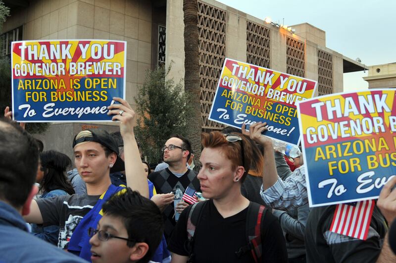 articles/2014/02/27/it-s-still-legal-to-fire-gays-in-arizona/140227-bixby-arizona-tease_wdwkqp