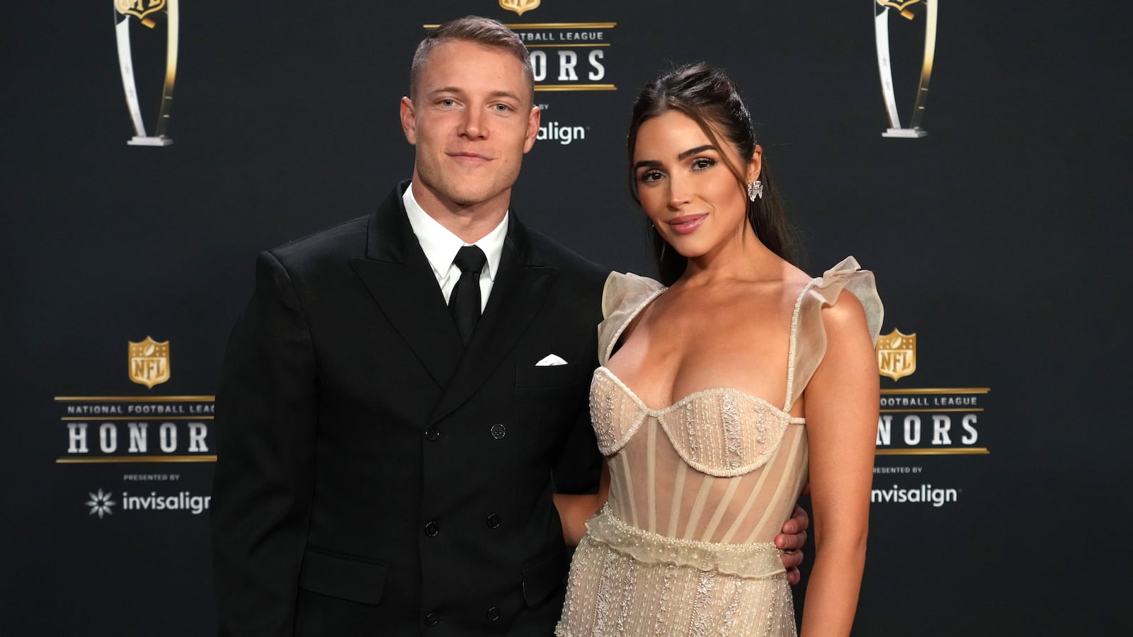 Christian McCaffrey and Olivia Culpo