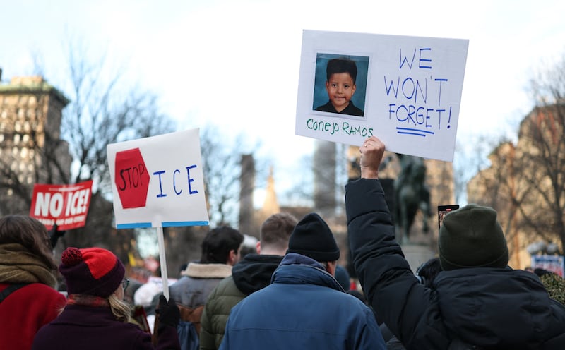 People hold a photo of Liam Conejo Ramos, a five-year-old boy who was held by immigration officers, during an "ICE Out" protest in New York on January 23, 2026 against US Immigration and Customs Enforcement (ICE).