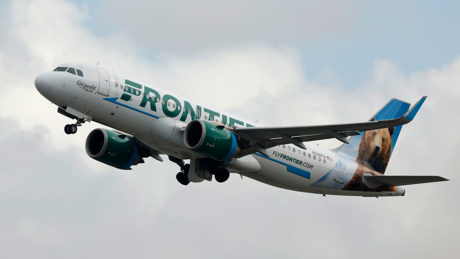 A Frontier Airlines Airbus A320 airplane departs Los Angeles International Airport on March 30, 2025.