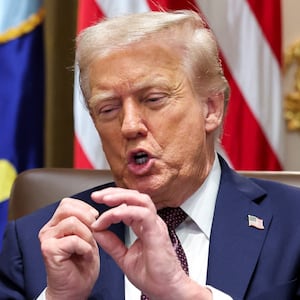 U.S. President Donald Trump gestures during a cabinet meeting at the White House in Washington, D.C., U.S., August 26, 2025.