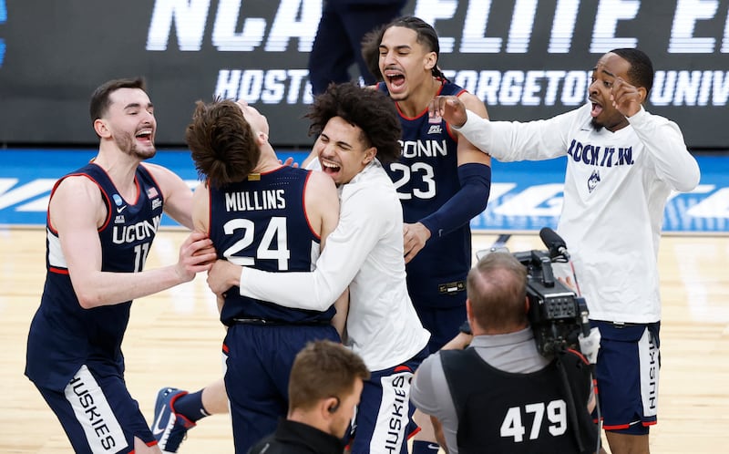 Mar 29, 2026; Washington, DC, USA; UConn Huskies forward Alex Karaban (11) celebrates with UConn Huskies guard Braylon Mullins (24) after defeating the Duke Blue Devils in an Elite Eight game of the East Regional of the men's 2026 NCAA Tournament