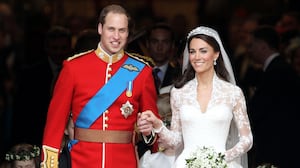 Prince William and Princess Catherine smile following their marriage at Westminster Abbey on April 29, 2011, in London, England.