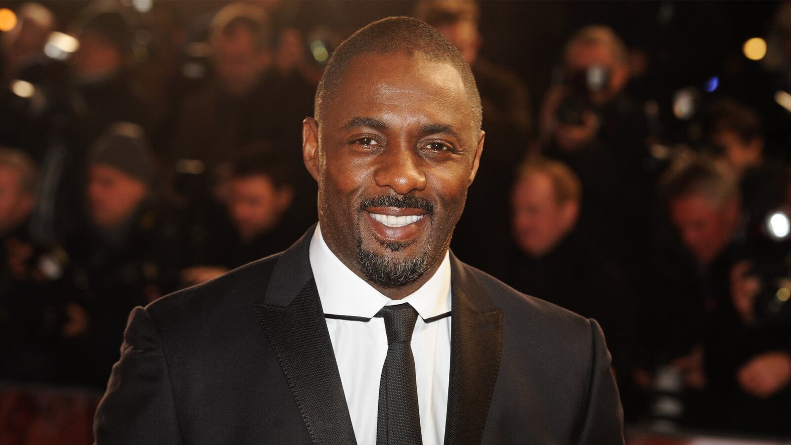 articles/2015/09/01/no-idris-elba-is-not-too-street-for-james-bond/150901-bugbee-idris-elba-tease_tdb5kp
