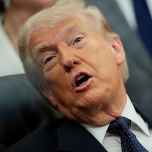 President Donald Trump speaks during an event to sign a memorandum in the Oval Office at the White House on May 5, 2026.