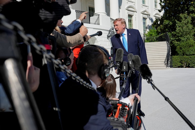 US President Donald Trump speaks with media before boarding Marine One as he travels to Grand Island, Nebraska, on the South Lawn of the White House in Washington, D.C., US, October 5, 2026. REUTERS/Eric Lee