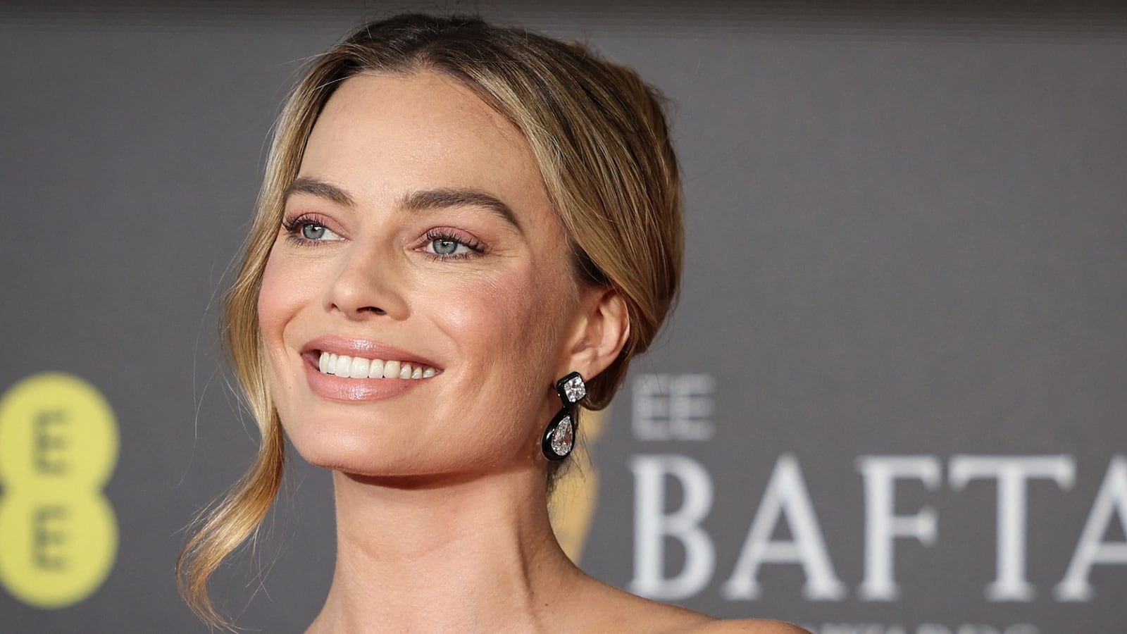 TOPSHOT - Australian actress Margot Robbie poses on the red carpet upon arrival at the BAFTA British Academy Film Awards at the Royal Festival Hall, Southbank Centre, in London, on February 18, 2024. (Photo by Adrian DENNIS / AFP) (Photo by ADRIAN DENNIS/AFP via Getty Images)