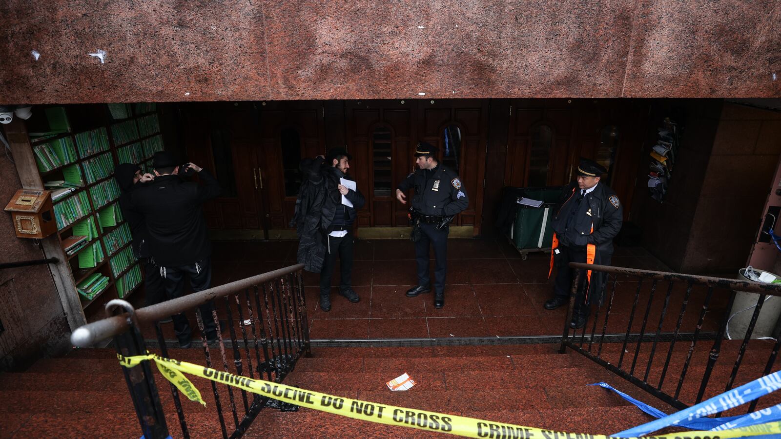 Police officers respond to the Chabad-Lubavitch World Headquarters