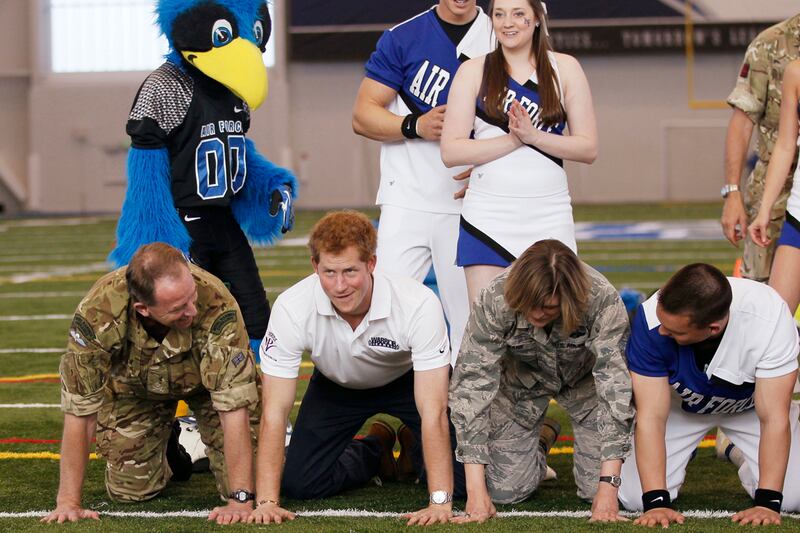 articles/2013/05/13/prince-harry-in-human-pyramid-pictures-sfw-in-case-you-re-wondering/harry-pyramid1_k1hcru