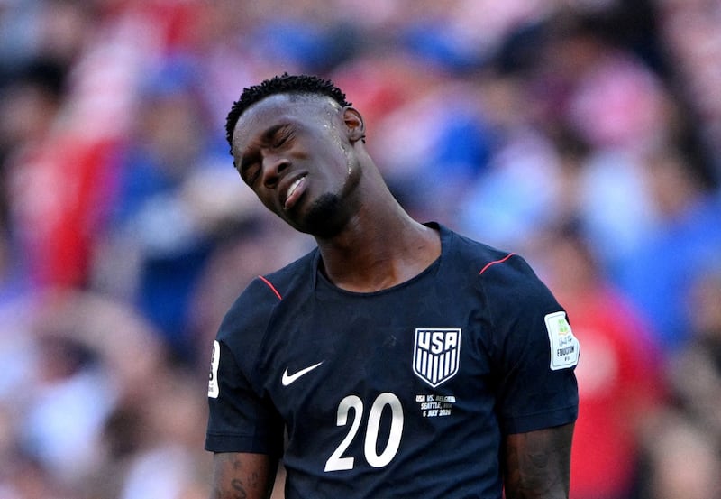 Folarin Balogun of the U.S. looks dejected after Belgium's Hans Vanaken scores their third goal.