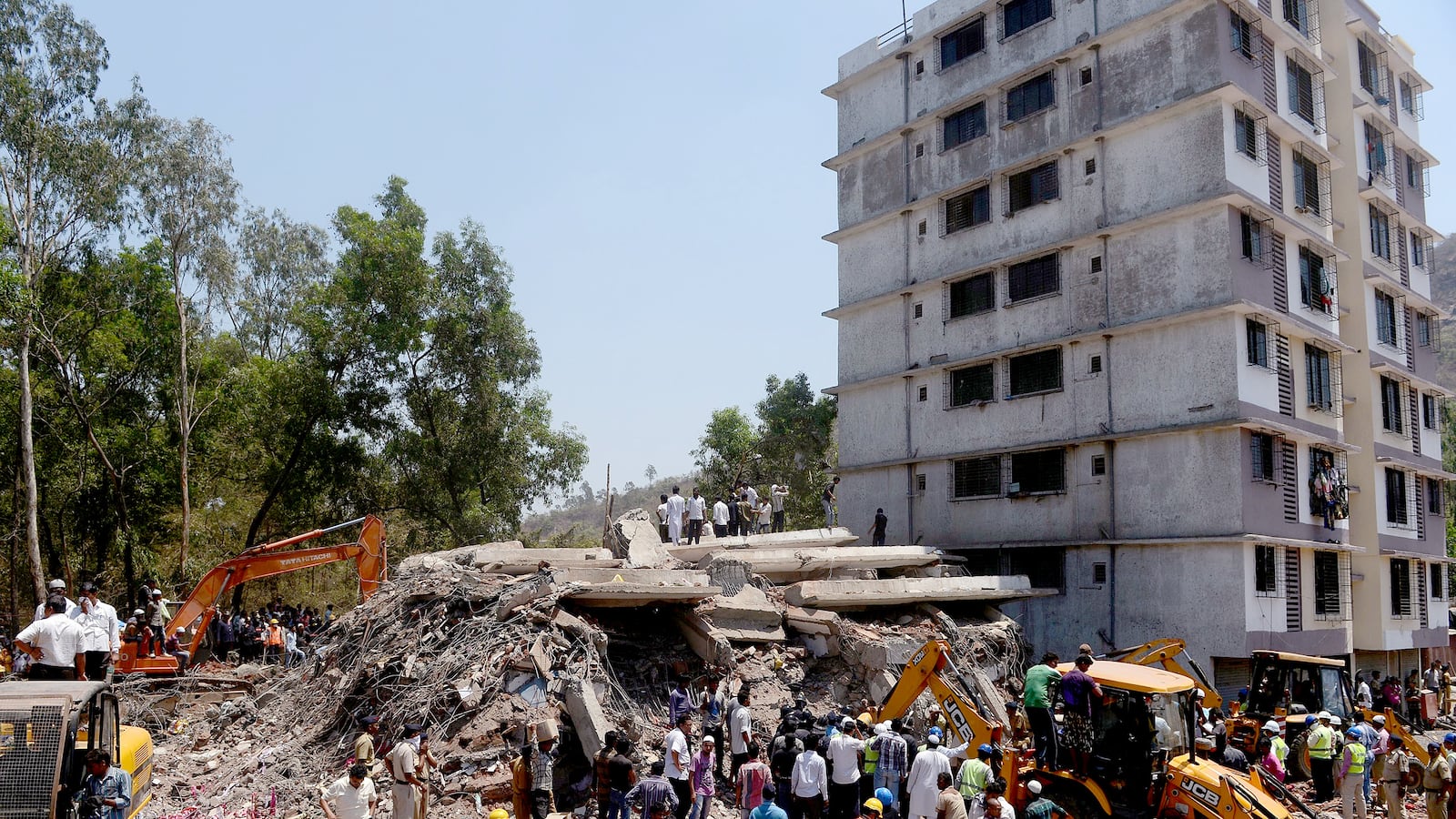 articles/2013/04/12/they-all-fall-down-the-perils-of-mumbai-housing/130412-DSouza-Building-India-tease_cya8hy