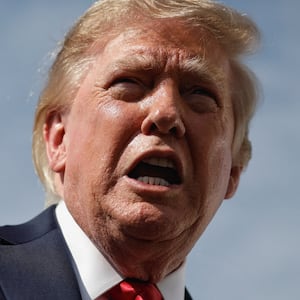 U.S. President Donald Trump gestures as he speaks to the media before boarding Air Force One at Joint Base Andrews in Maryland, U.S., en route to Myrtle Beach, South Carolina, August 21, 2026. REUTERS/Evan Vucci