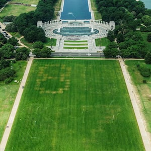 Authorities responded to what appeared to be a large tracing of the term 8647 into the grounds of the National Mall in Washington, D.C., June 11, 2026. A Reuters photographer captured the emerging image from atop the Washington Monument on the Mall's grass shortly before authorities arrived. The arrangement of the numbers was clearly an attempt to show 8647, though the 4 was not fully formed. Federal prosecutors on other occasions have said the term could indicate a threat to President Trump, the 47th U.S. president. REUTERS/Nathan Howard REFILE - QUALITY REPEAT     TPX IMAGES OF THE DAY