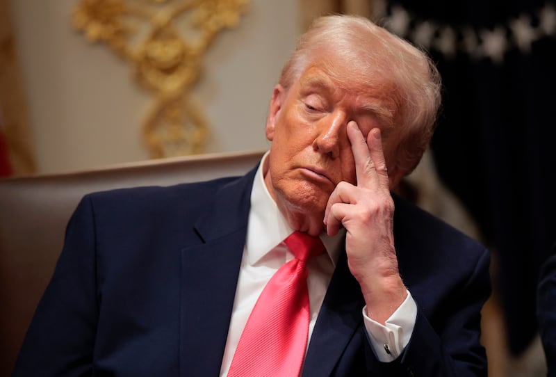 President Donald Trump attends a meeting of his Cabinet in the Cabinet Room of the White House on December 02, 2025, in Washington, DC.