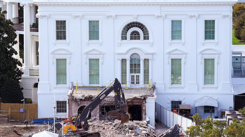 WASHINGTON, DC - OCTOBER 23: An excavator works to clear rubble after the East Wing of the White House was demolished on October 23, 2025 in Washington, DC. The demolition is part of U.S. President Donald Trump's plan to build a multimillion-dollar ballroom on the eastern side of the White House. (Photo by Eric Lee/Getty Images)