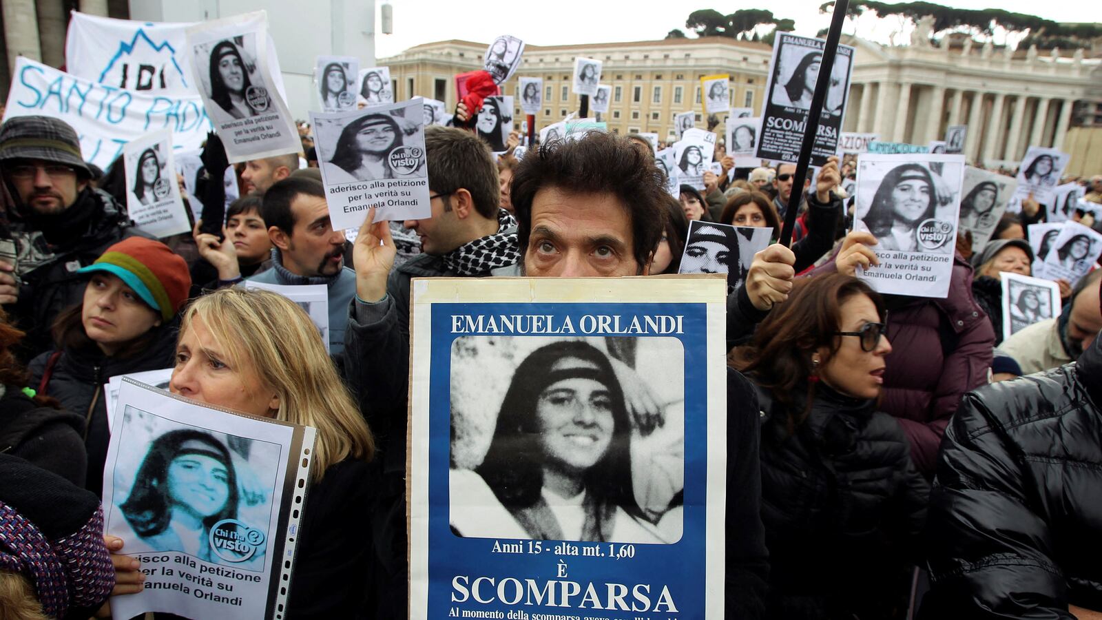 Pietro, brother of Emanuela Orlandi, holds a banner with her picture in front of St. Peter’s Square.