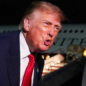 U.S. President Donald Trump speaks to reporters on the tarmac before boarding Air Force One after attending the Republican Midterm Convention on September 10, 2026 at Dallas Fort Worth International Airport, Texas.