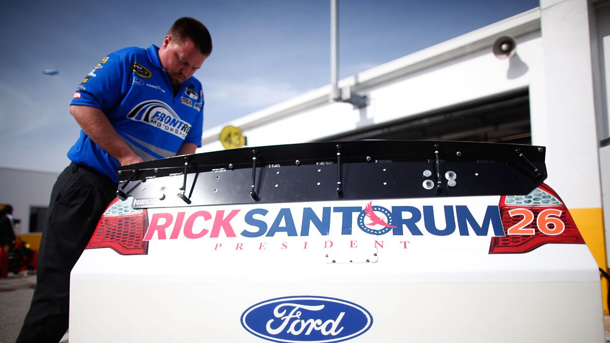 articles/2012/02/27/never-mind-war-with-satan-santorum-s-ad-man-just-aims-to-move-numbers/santorum-daytona-jacobs_e7a8wn