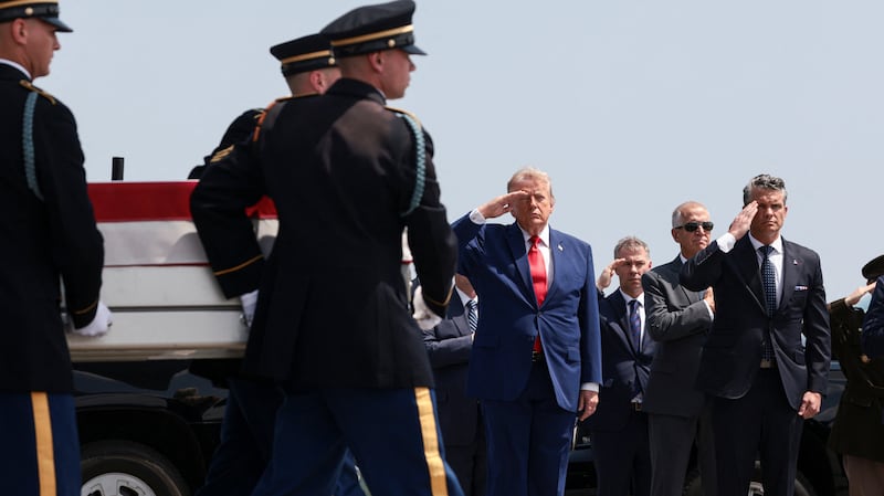 Trump and Hegseth salute as members of the military carry the transfer case of U.S. Army 1st Lt. Tyler James Feehan of the 2nd Battalion, 55th Air Defense Artillery Regiment, 32nd Army Air Missile Defense Command, who was killed during an attack at Muwaffaq Salti Air Base in Jordan.