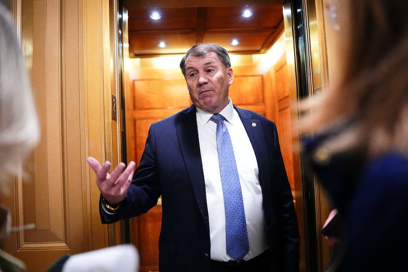 U.S. Senator Mike Rounds (R-OH) speaks with reporters outside the Senate Chamber on the 40th day of the partial government shutdown, in Washington, D.C., U.S., November 9, 2025. REUTERS/Aaron Schwartz