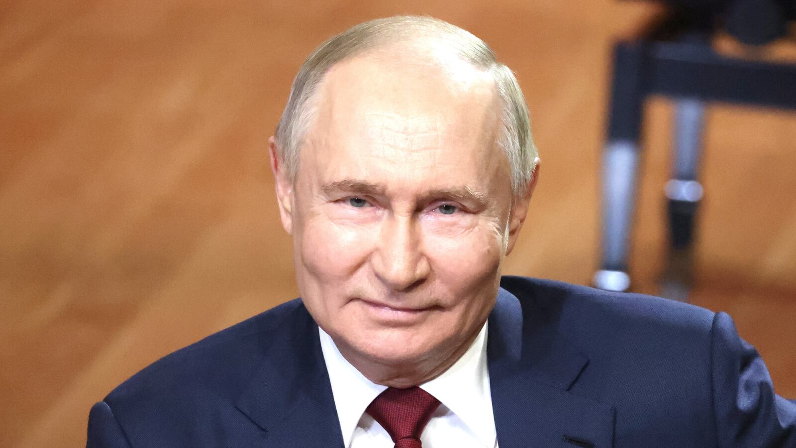 Vladimir Putin smiles during his meeting with students at the Siruis Education Center For Talented Children, May 18, 2025 in Sirius, Russia.