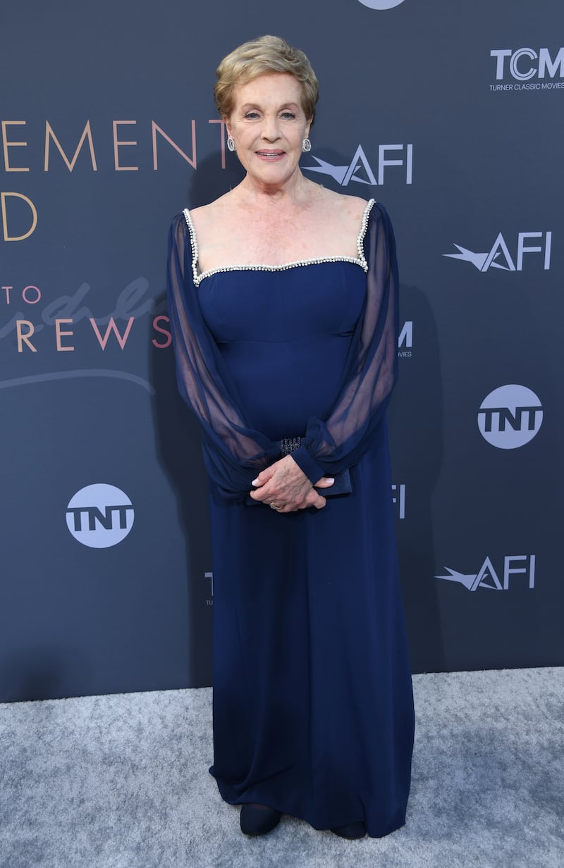 Julie Andrews attends the AFI Life Achievement Award Tribute Gala in a floor-length royal blue gown in 2022.
