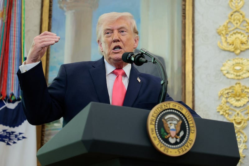 U.S. President Donald Trump speaks as he attends Markwayne Mullin's swearing-in as Department of Homeland Security (DHS) Secretary, at the White House in Washington, D.C., U.S., March 24, 2026. REUTERS/Evan Vucci
