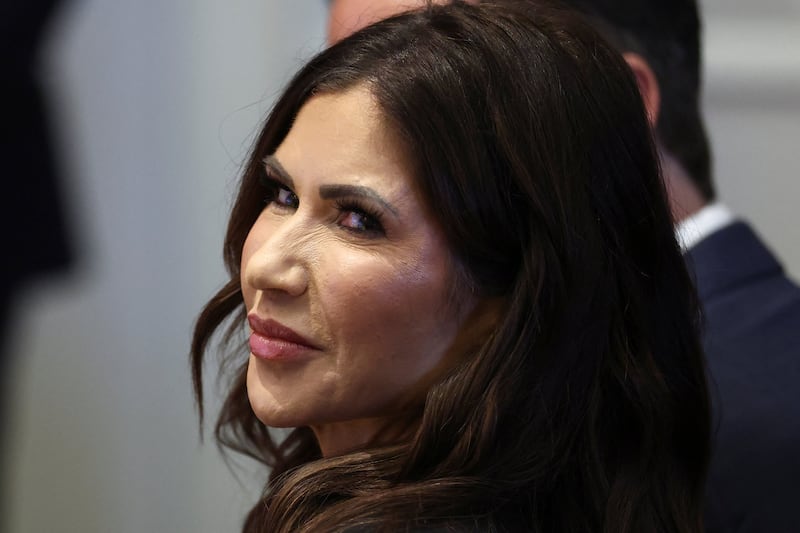 Kristi Noem reacts as she attends the "Shield of the Americas" Summit in Miami, Florida, U.S., March 7, 2026. REUTERS/Kevin Lamarque