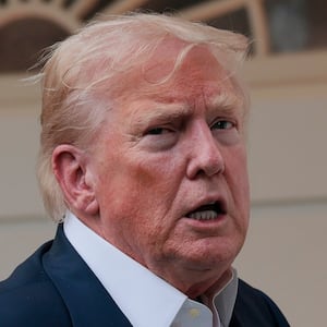 President Donald Trump speaks to reporters near the Rose Garden after returning to the White House on Marine One on July 29, 2025 in Washington, DC.