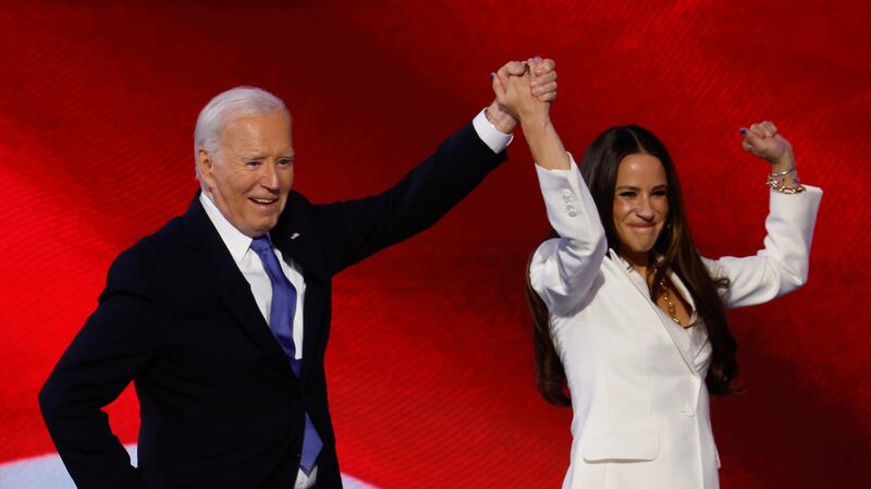 CHICAGO, ILLINOIS - AUGUST 19: U.S. President Joe Biden and First Daughter Ashley Biden appear onstage during the first day of the Democratic National Convention at the United Center on August 19, 2024 in Chicago, Illinois.  Delegates, politicians, and Democratic party supporters are in Chicago for the convention, concluding with current Vice President Kamala Harris accepting her party's presidential nomination. The DNC takes place from August 19-22.