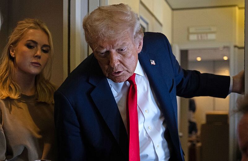 US President Donald Trump speaks to the press as he flies back to the United States from the United Kingdom onboard Air Force One on September 18, 2025. (Photo by ANDREW CABALLERO-REYNOLDS / AFP) (Photo by ANDREW CABALLERO-REYNOLDS/AFP via Getty Images)