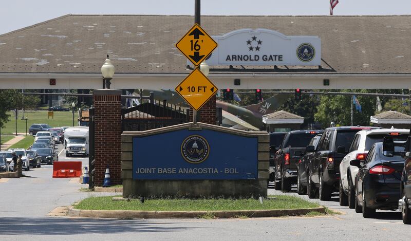 Traffic is backed up going into and out of Joint Base Anacostia-Bolling after the U.S. military base was put on lockdown due to a report of a suspicious armed person on site in Washington, U.S., August 13, 2021.   REUTERS/Evelyn Hockstein