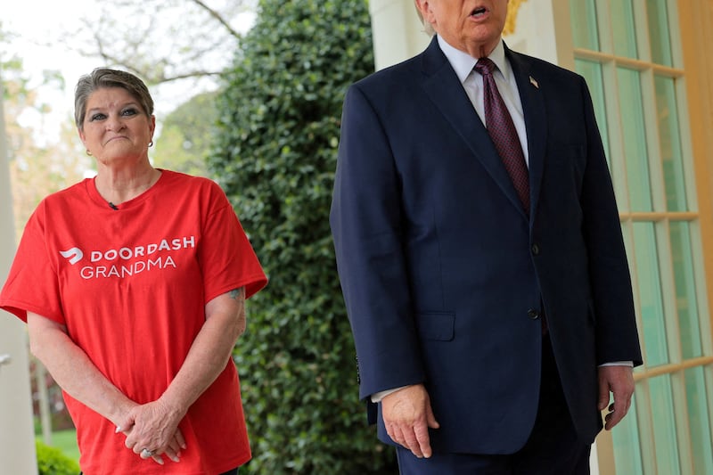 Trump explained the reason for the delivery, his makeup-slathering right hand visible.