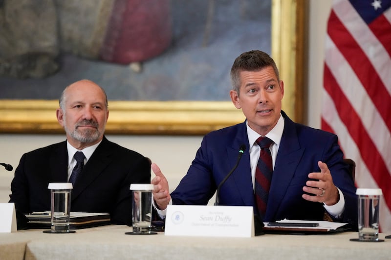 Howard Lutnick and Sean Duffy attend a meeting of the FIFA Task Force at the White House in Washington, D.C., U.S., May 6, 2025.