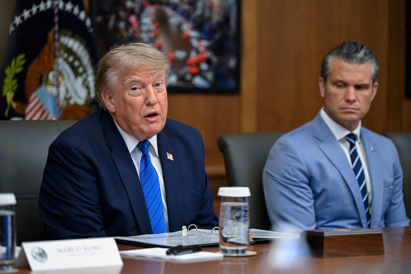 U.S. President Donald Trump and Secretary of Defense Pete Hegseth participate in a cabinet meeting at Camp David in Thurmont, Maryland, U.S., July 31, 2026. REUTERS/Daniel Heuer