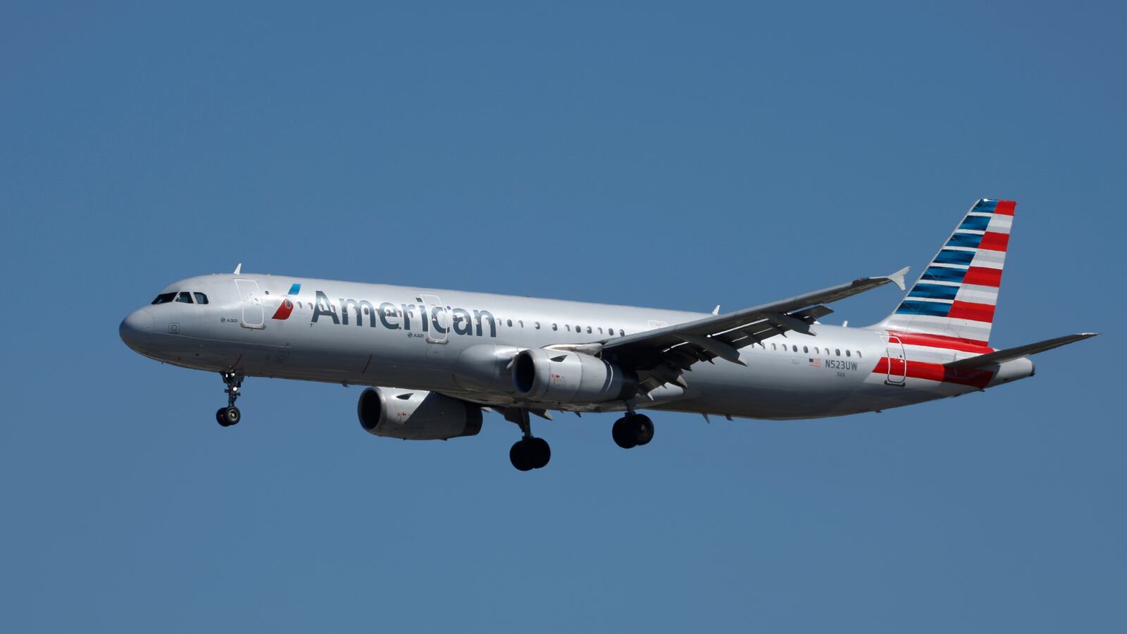 An American Airlines Airbus A321-231 aircraft approaches San Diego International Airport for a landing from Dallas on March 4, 2025 in San Diego, California.