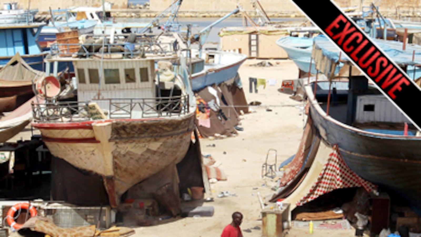 articles/2012/05/28/exclusive-libya-s-civil-crackdown-worries-democracy-advocates/libya-tripoli-poor-ngo-box_f72wrw