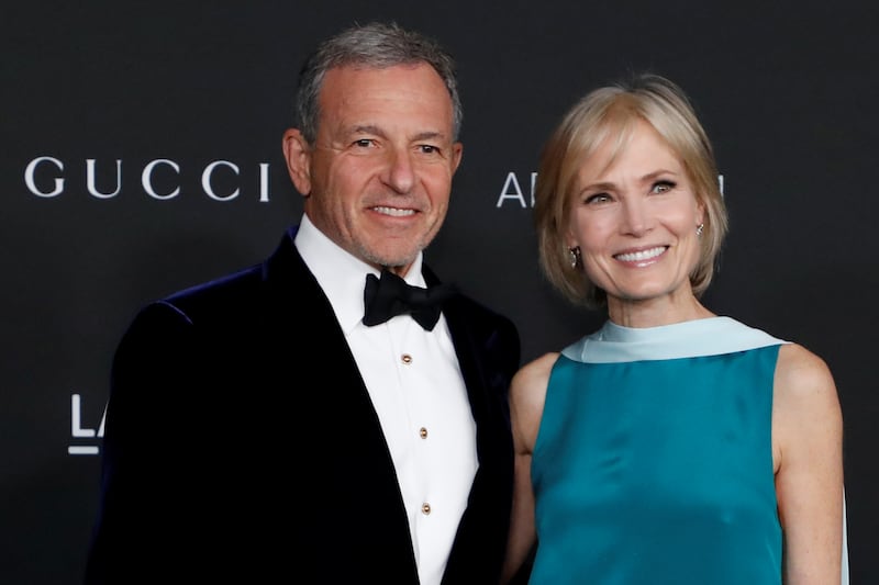 Disney Chairman Bob Iger and wife Willow Bay pose at the LACMA Art+Film Gala in Los Angeles, California, U.S. November 6, 2021. REUTERS/Mario Anzuoni
