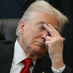 TOPSHOT - US President Donald Trump gestures as Secretary of Health and Human Services Robert F. Kennedy Jr. speaks during an event about weight-loss drugs in the Oval Office of the White House in Washington, DC on November 6, 2025. Trump announced deals Thursday with pharmaceutical giants Eli Lilly and Novo Nordisk to lower the prices of some popular weight-loss drugs. Both companies "have agreed to offer their most popular GLP-1 weight-loss drug," Trump said, "at drastic discounts." (Photo by ANDREW CABALLERO-REYNOLDS / AFP) (Photo by ANDREW CABALLERO-REYNOLDS/AFP via Getty Images)