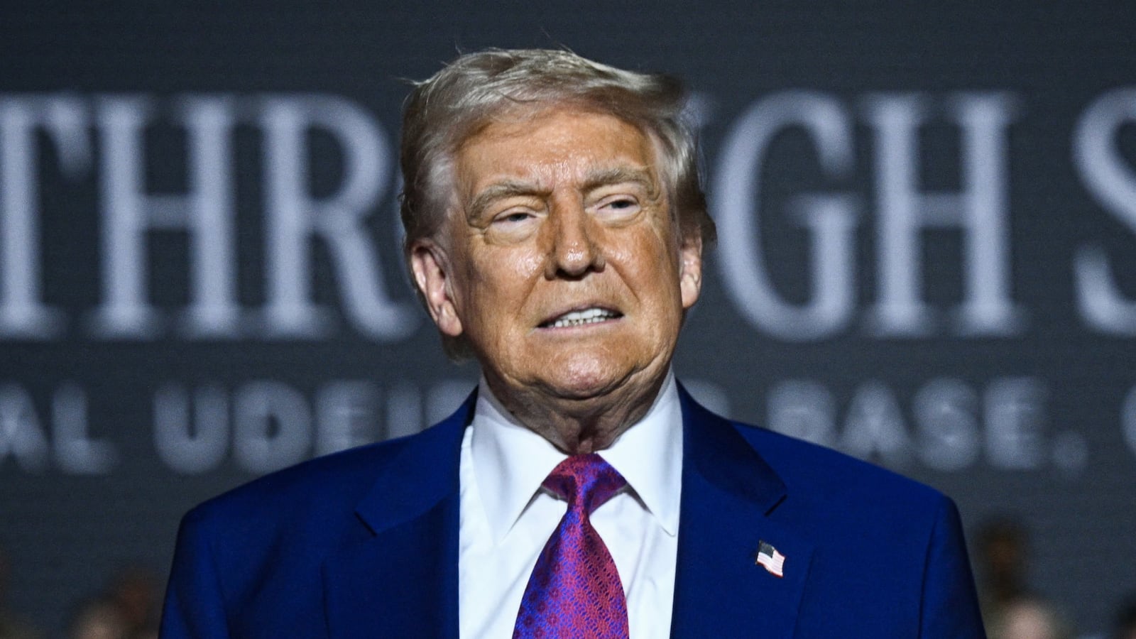 TOPSHOT - US President Donald Trump greets troops at the Al-Udeid air base southwest of Doha on May 15, 2025. (Photo by Brendan SMIALOWSKI / AFP) (Photo by BRENDAN SMIALOWSKI/AFP via Getty Images)