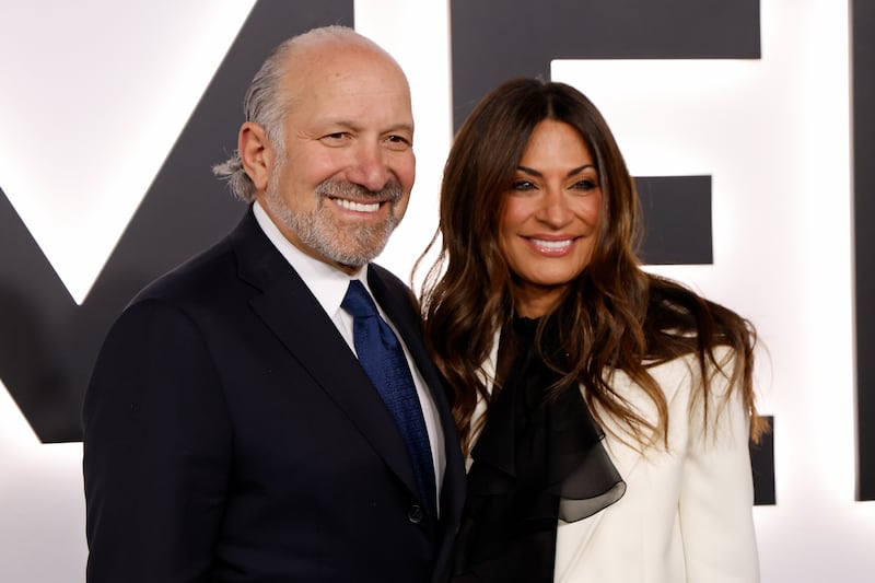 Commerce Secretary Howard Lutnick and his wife Allison Lutnick, pictured attending the premiere of "Melania" on January 29, 2026. On Friday, the latest batch of Epstein documents released showed Lutnick planned a visit to Epstein's island in 2012 with his family despite previously trying to distance himself from his former Upper East Side next-door neighbor.