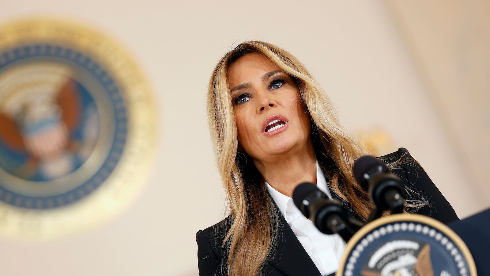 WASHINGTON, DC - OCTOBER 10: First lady Melania Trump delivers remarks in the Grand Foyer at the White House on October 10, 2025 in Washington, DC. The first lady announced she and Russian President Vladimir Putin have an "open channel of communication" to help reunite Ukrainian children displaced by the Russian-Ukraine war with their families. (Photo by Kevin Dietsch/Getty Images)
